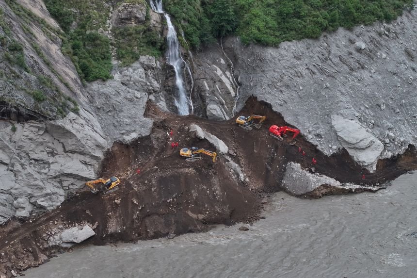 A drone view shows excavators and rescue workers at the core disaster-hit area at Gyirong Port following the August 26 mudslide, in Shigatse, Tibet Autonomous Region, China, on  September 1, 2026.