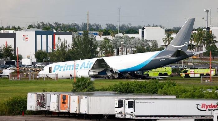 Amazon cargo plane crashes at Miami airport, killing at least five, injuring scores